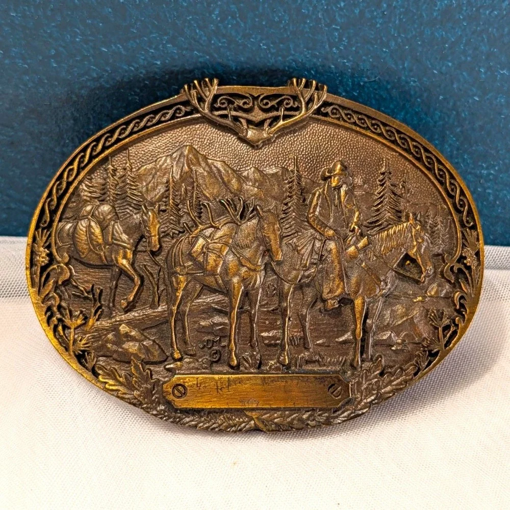 Montana Silversmiths Pack Horses and Rider Western Belt Buckle Antler Brass